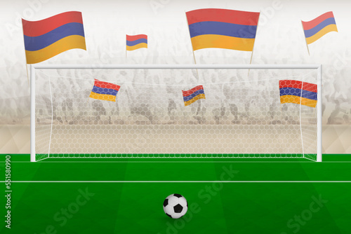 Armenia football team fans with flags of Armenia cheering on stadium, penalty kick concept in a soccer match.