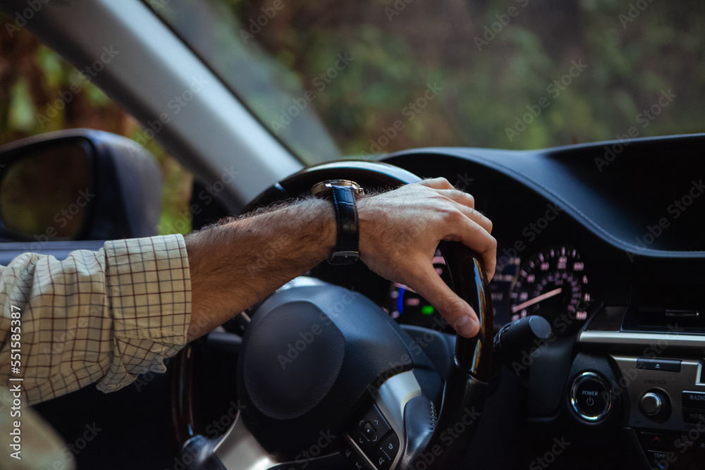 middle aged man driving a car middle aged man driving a car