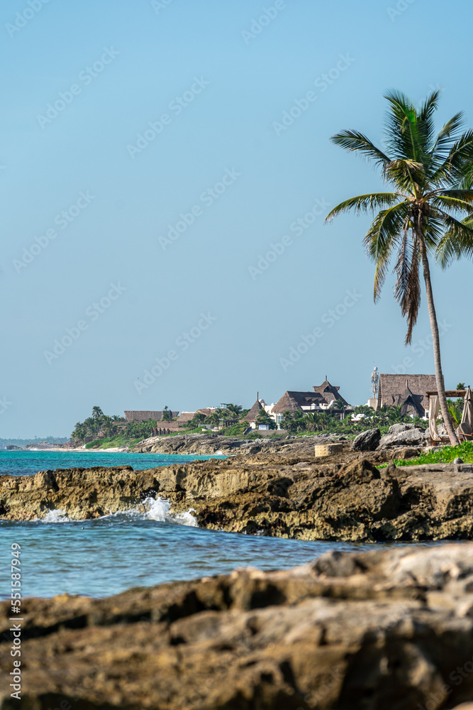 Naklejka premium Waves crash on the rocky Caribbean coast in Tulum, Mexico.