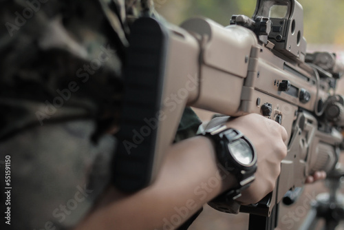 Shooter with assault scar rifle at target 