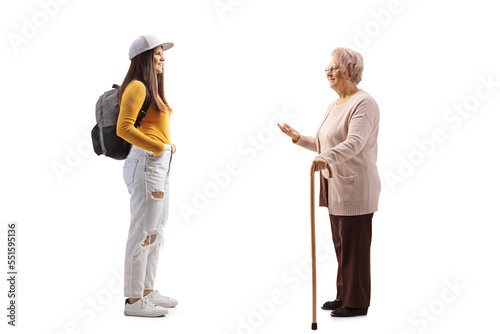 Young female listening to her grandmother talking