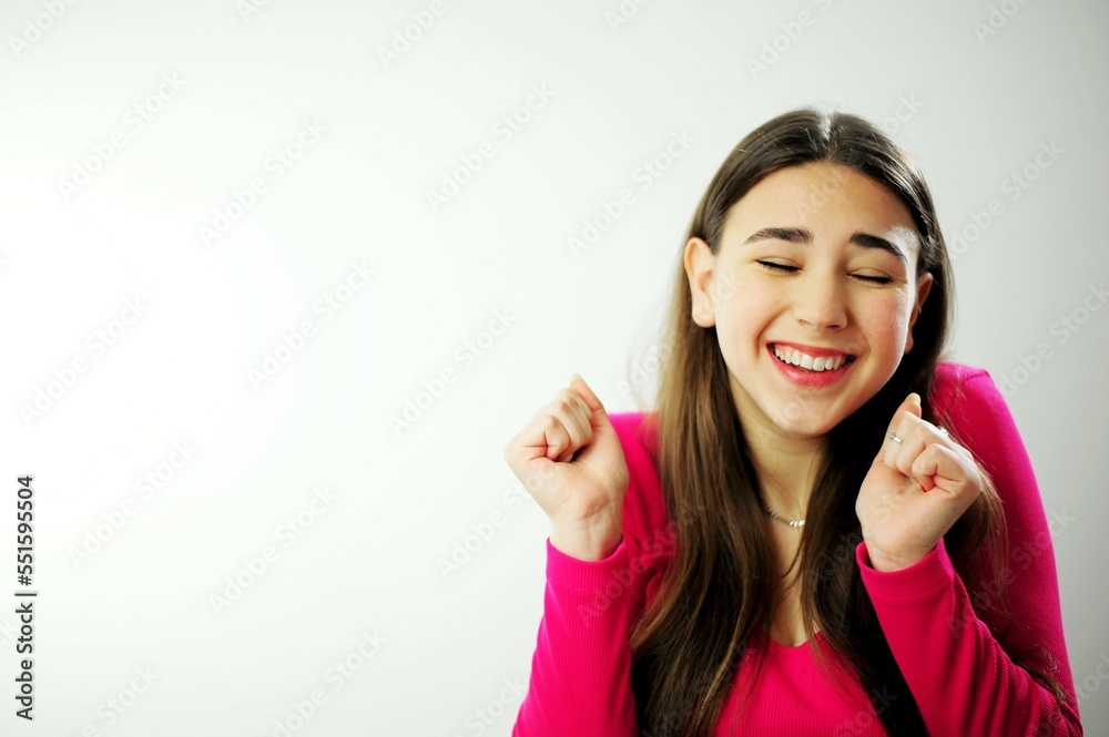 Happy mature young girl lady sitting on couch, holding video call with friends, head shot close up portrait. Web cam view laughing middle aged woman having fun, talking with grown up children online Happy mature young girl lady sitting on couch, holding video call with friends, head shot close up portrait. Web cam view laughing middle aged woman having fun, talking with grown up children online