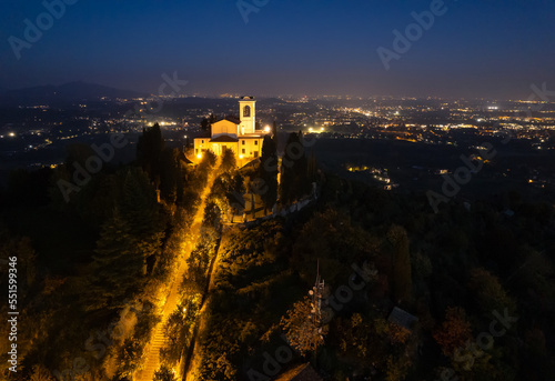 Aerial view of sanctuary of Beata Vergine del Carmelo at night, Montevecchia, Lecco, Lombardy, Italy photo