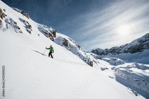 Man ski touring in Austrian Alps, Arlberg, Vorarlberg, Austria photo
