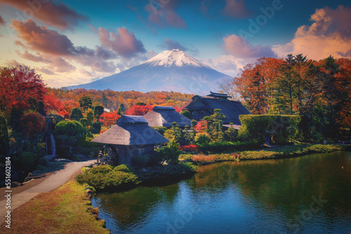 The ancient Oshino Hakkai village with Mt. Fuji in Autumn Season at Minamitsuru District, Yamanashi Prefecture, Japan. photo