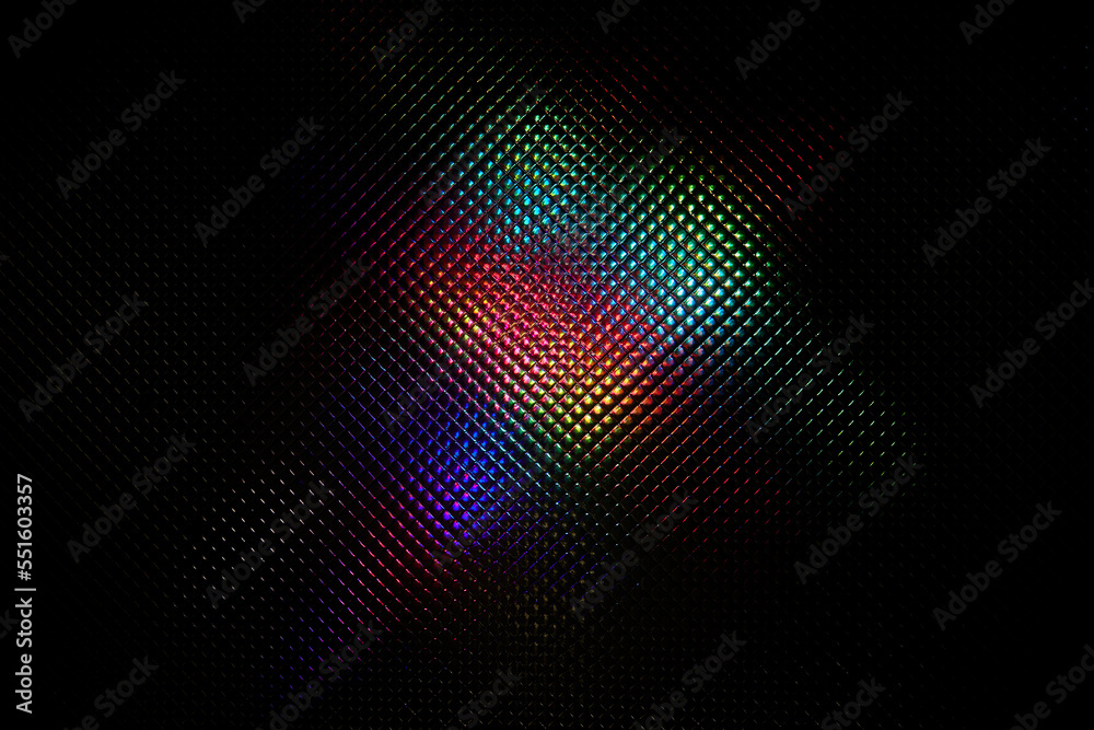 Abstract glass texture for design works. Glare with a spectral gradient on a dark background. Imitation of rainbow color. Background with texture.