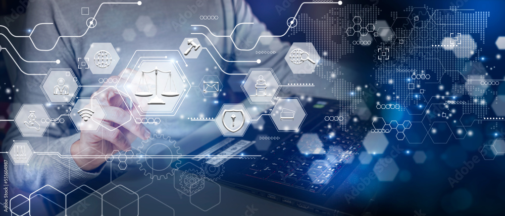 Naklejka premium Man touching the icon of the balance of justice. Concept of legal advice, law and defense.