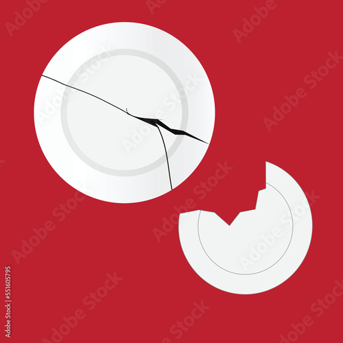 Broken plates on red background
