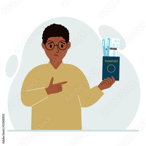 A man holds a passport with air tickets. The man shows the boarding pass. Travel concept.