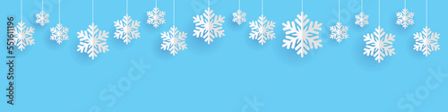 Background with snowflakes hanging on a string.  Vector design.