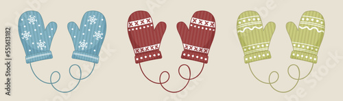Christmas winter mittens set. Blue, green and red mittens with embroidery.  Can be used for cards, prints, paper. Isolated vector illustration.