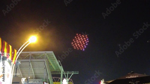 Outdoor Drone Lightshow At Night With A Spinning Square Cube