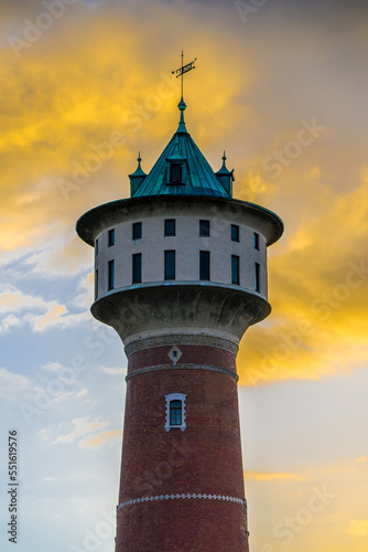 Watertower in Mannheim Germany on sky clouds background