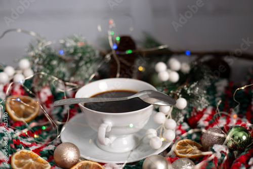 a cup of coffee in a Christmas atmosphere