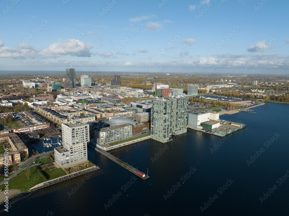 Almere medium large dutch city in province of Flevoland, The Netherlands, Skyline downtown city center, Almere Stad center, city build below sea level, Infrastructure and urban aerial view.