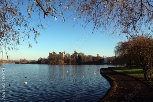 Linlithgow Palace and St Michael's Church, with Linlithgow Loch in the foreground.