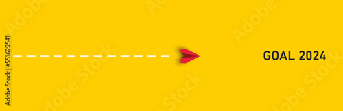 Red plane is heading to its 2024 Goal. business creativity new idea discovery innovation technology. new year idea concept.