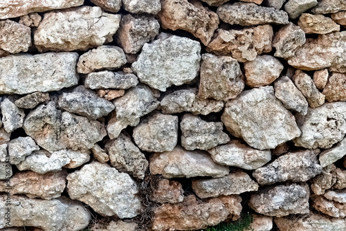 Background texture of warm coloured dry stone wall