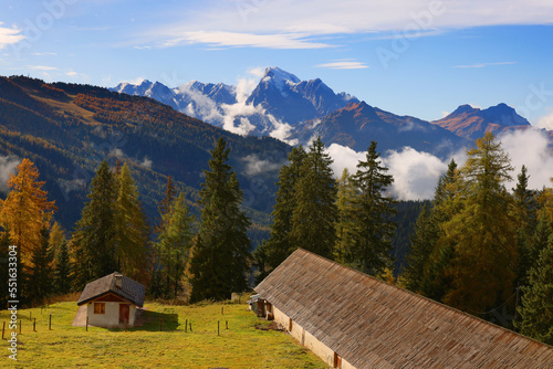 Scenic view at sunset with Marmolada Peak, the highest mountain of Dolomites, Italy, Europe
 photo