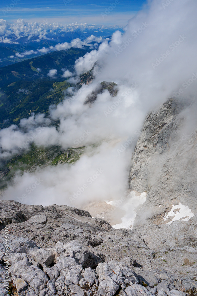 Incredible view into the valley into Styria and Upper Austria from Dachstein Peak. Highest mountain in 2 provinces in austria Incredible view into the valley into Styria and Upper Austria from Dachstein Peak. Highest mountain in 2 provinces in austria