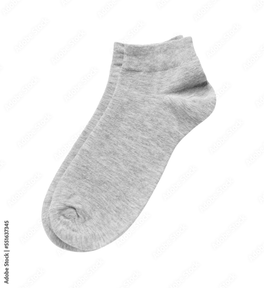 Pair of grey socks on white background, top view