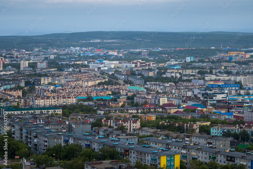 Morning cityscape. Top view of the buildings and streets of the city. Residential urban areas at dawn. Beautiful aerial city landscape. Petropavlovsk-Kamchatsky, Kamchatka Krai, Far East of Russia.