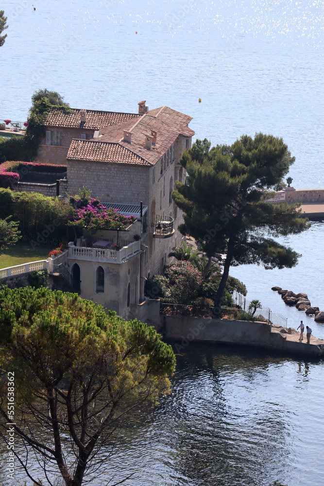 Saint-Jean-Cap-Ferrat, France - July 29, 2021: View to the luxury villas on the Saint-Jean-Cap-Ferrat peninsula