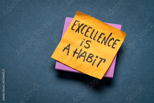 excellence is a habit - handwritten reminder note, personal development concept