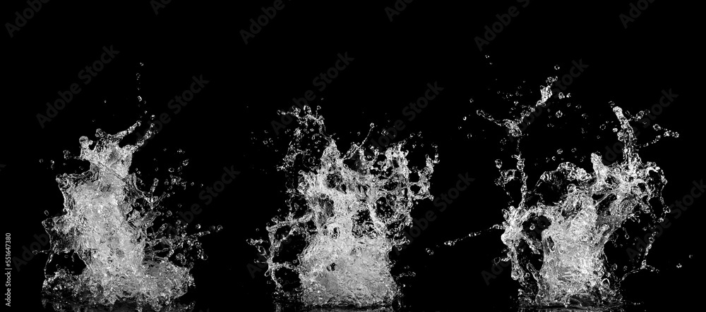Water splashes isolated on black background. Water splashes isolated on black background.