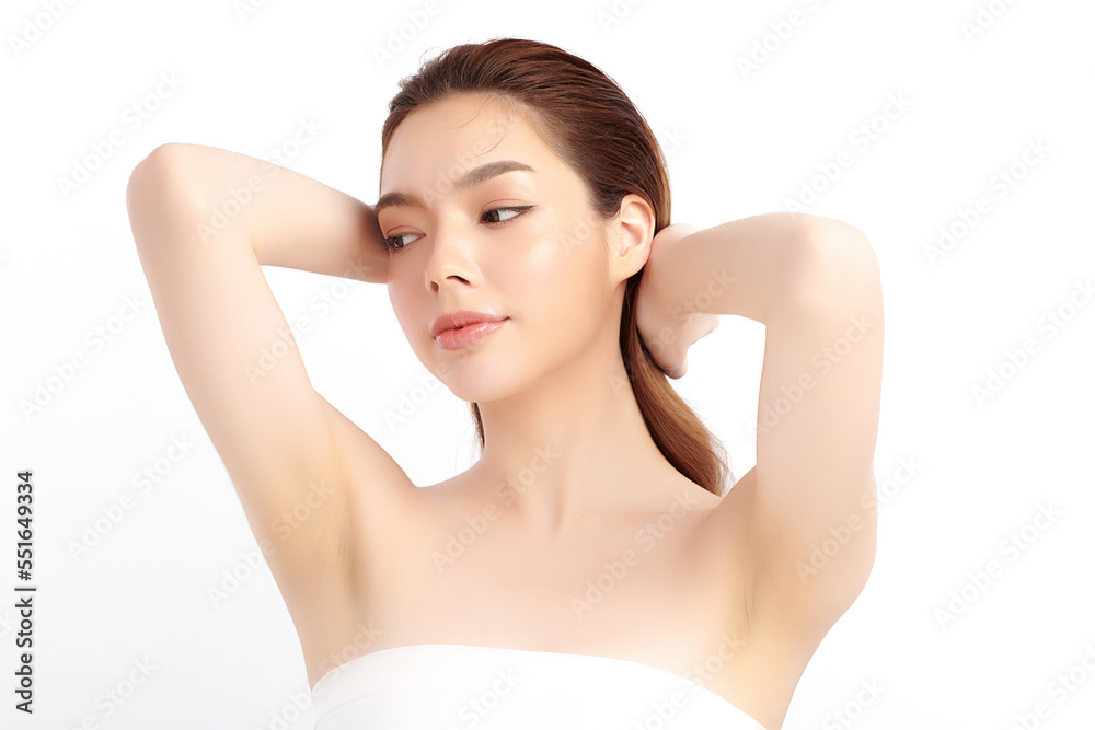Beautiful Young Asian woman lifting hands up to show off clean and hygienic armpits or underarms on white background, Smooth armpit cleanliness and protection concept Beautiful Young Asian woman lifting hands up to show off clean and hygienic armpits or underarms on white background, Smooth armpit cleanliness and protection concept