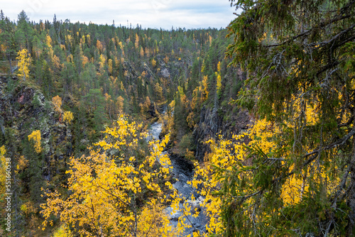 Water flowing in rapids in Oulanka canyon in autumnal Oulanka National Park, Northern Finland