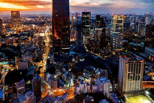 Photography Aerial view of the skyline and cityscape at sunset in Minato, Tokyo, Japan