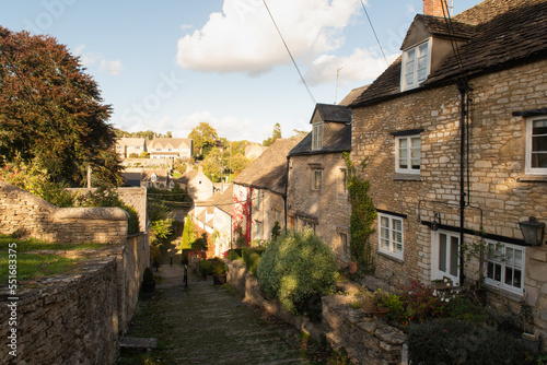 The Chipping Steps in Cotswold town of Tetbury, Gloucestershire, England, United Kingdom. Sunny day in Autumn. Select focus. photo