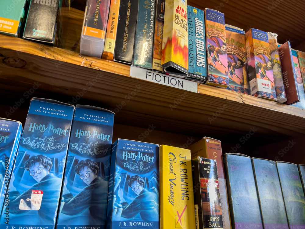 Fototapeta premium Redmond, WA USA - circa November 2022: Close up view of used audiobooks for sale inside a Half Price Books.