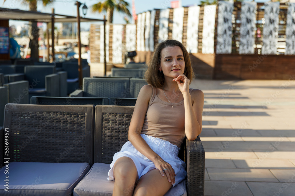 Portrait of a young stylish woman in a cafe Portrait of a young stylish woman in a cafe