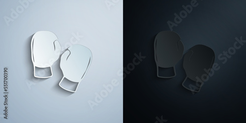 silhouette of boxing glove paper icon with shadow vector illustration