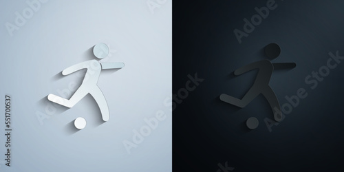 Soccer player with ball paper icon with shadow vector illustration