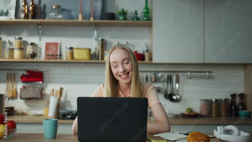 Girl talking video call with boyfriend send air kiss to web camera close up. Girl talking video call with boyfriend send air kiss to web camera close up.