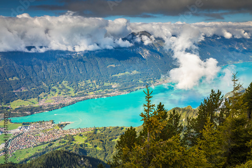 Aerial view of Swiss Alps and Lake Brienz at dramatic sunset  Interlaken