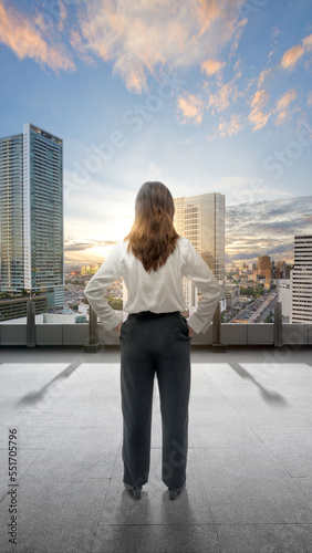 Rear view of Asian businesswoman standing