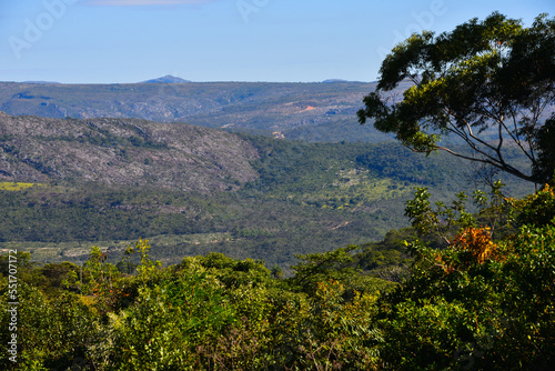 The green and rugged landscape of the Serra do Espinha  o range as seen from the remote village of S  o Gon  alo do Rio das Pedras  Minas Gerais state  Brazil