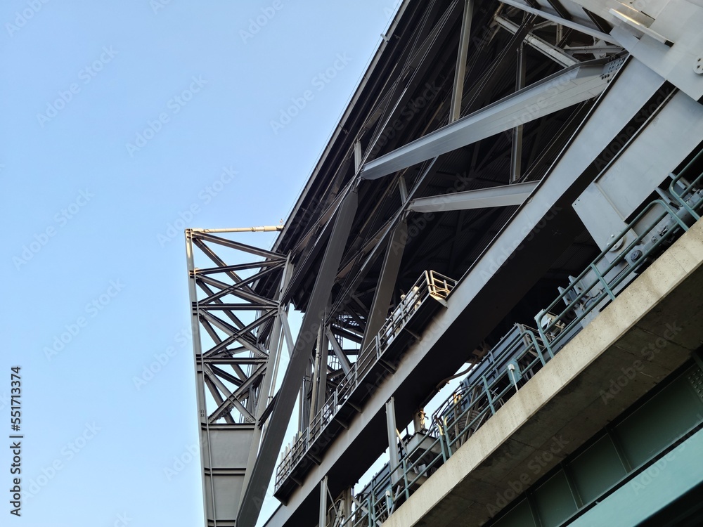 Steel building structure under sky