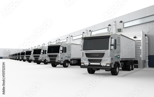 Group of logistic trailer trucks or lorries at warehouse