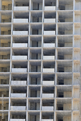Fragment of the facade of an unfinished multi-storey residential building