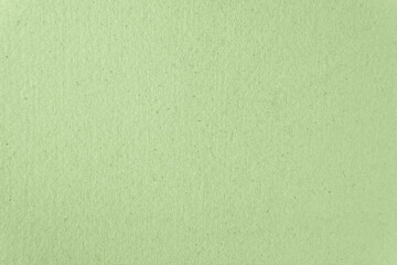 Recycled green color paint on cardboard box blank paper texture background