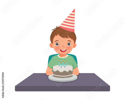 cute little boy having fun celebrating his birthday party