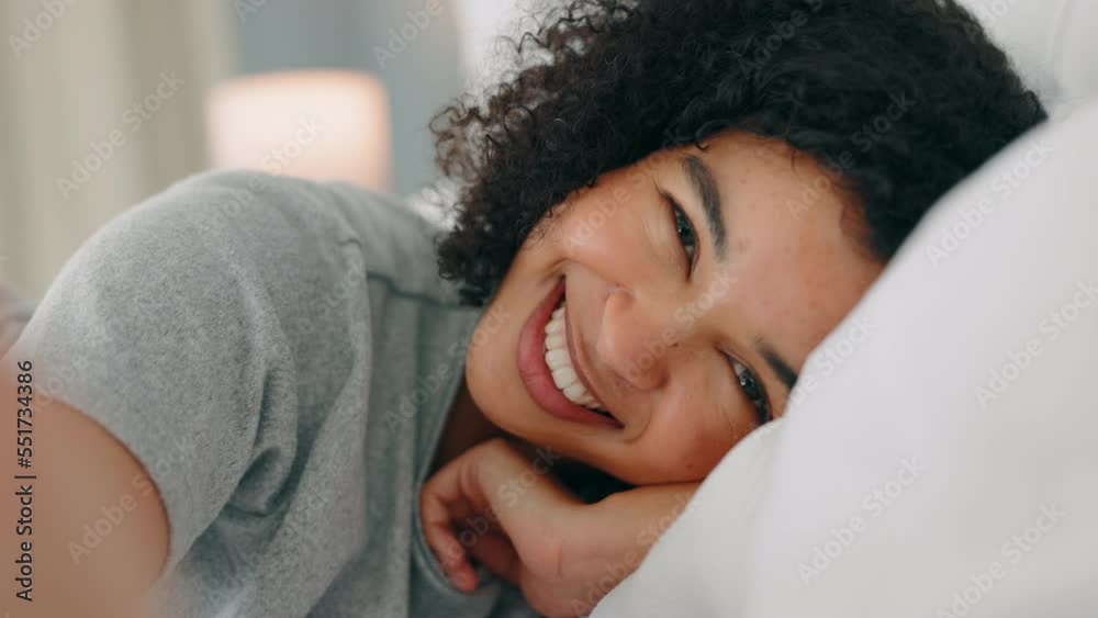 Black woman, bed and smile selfie, video call or influencer content talking and saying I love you in home bedroom before bedtime. Face of female on pillow to relax, sleep and communicate at night Black woman, bed and smile selfie, video call or influencer content talking and saying I love you in home bedroom before bedtime. Face of female on pillow to relax, sleep and communicate at night