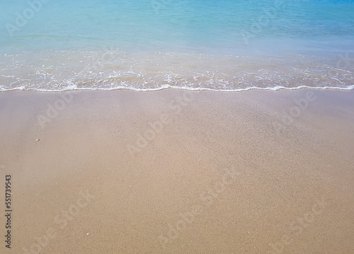 White sand beach with beautiful blue sea in high season.