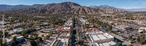 Daytime aerial view of the urban downtown area and mountains of Palm Desert, California, USA. photo