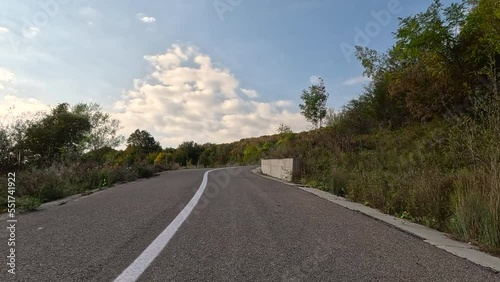 Wallpaper Mural View of the car on the road in the forest. POV View of the car driver on the road in the forest. 4K Torontodigital.ca
